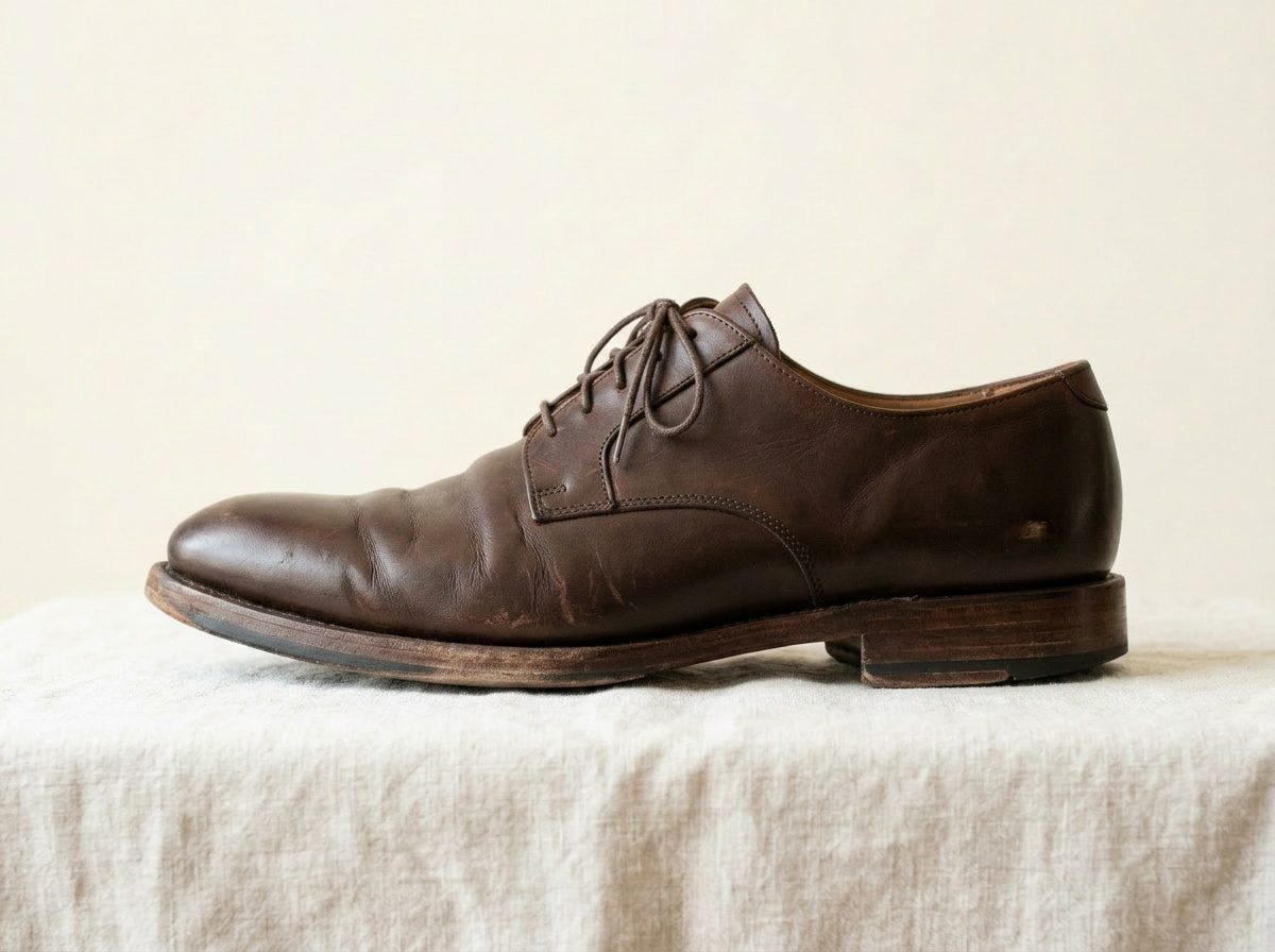 Derby uomo — prima del restauro