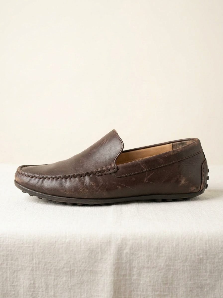 Mocassino in pelle — prima del restauro