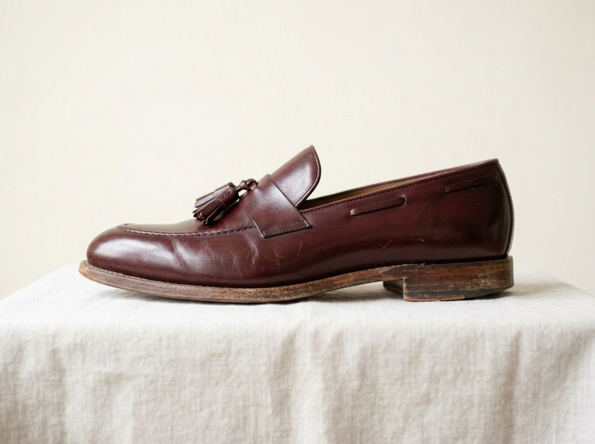 Mocassino con nappine — prima del restauro